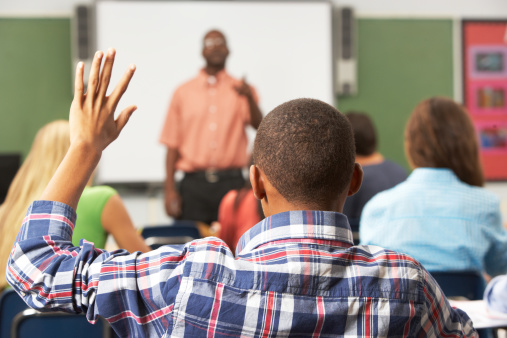 Student raising his hand